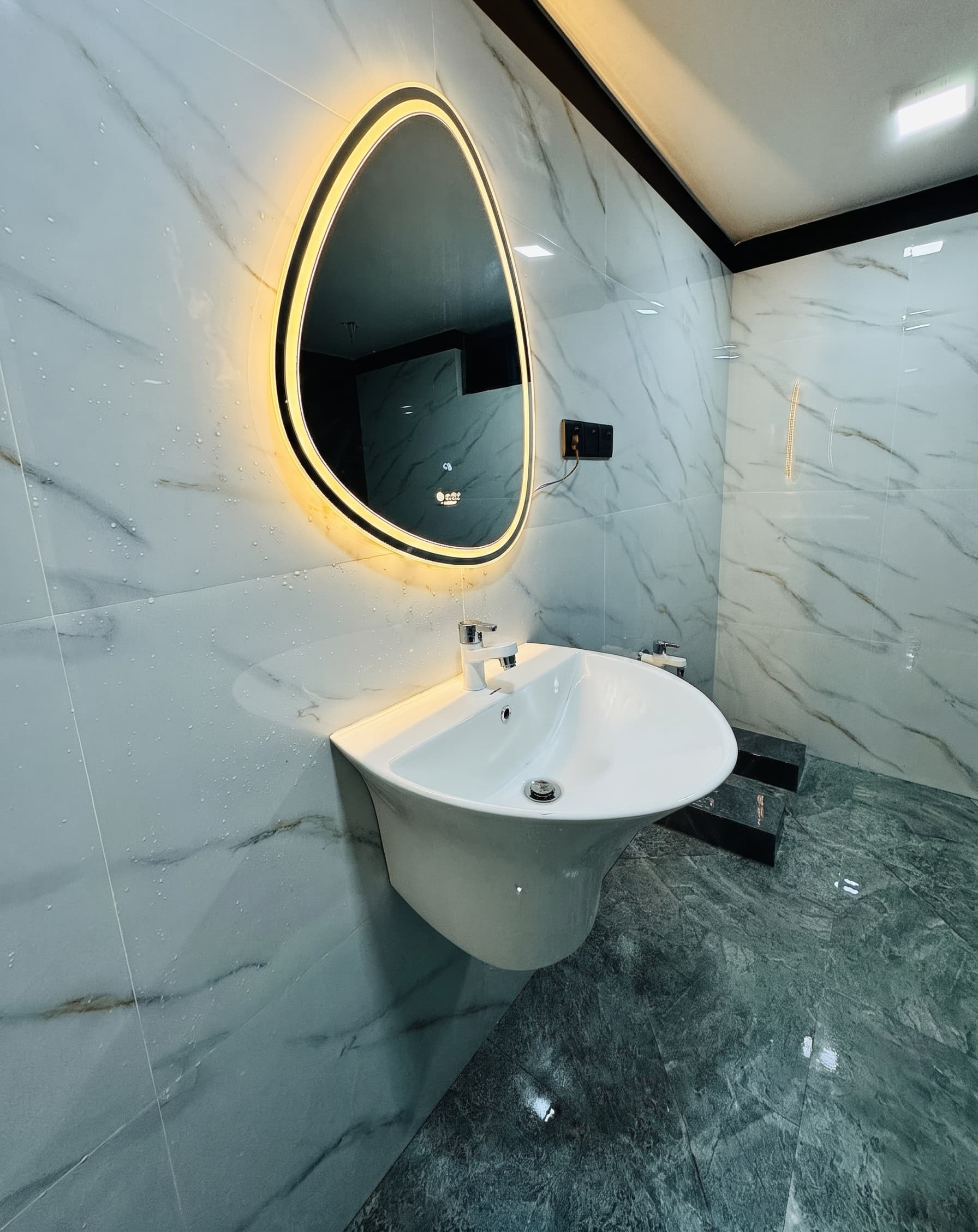 Bathroom renovation with modern fixtures and finishes